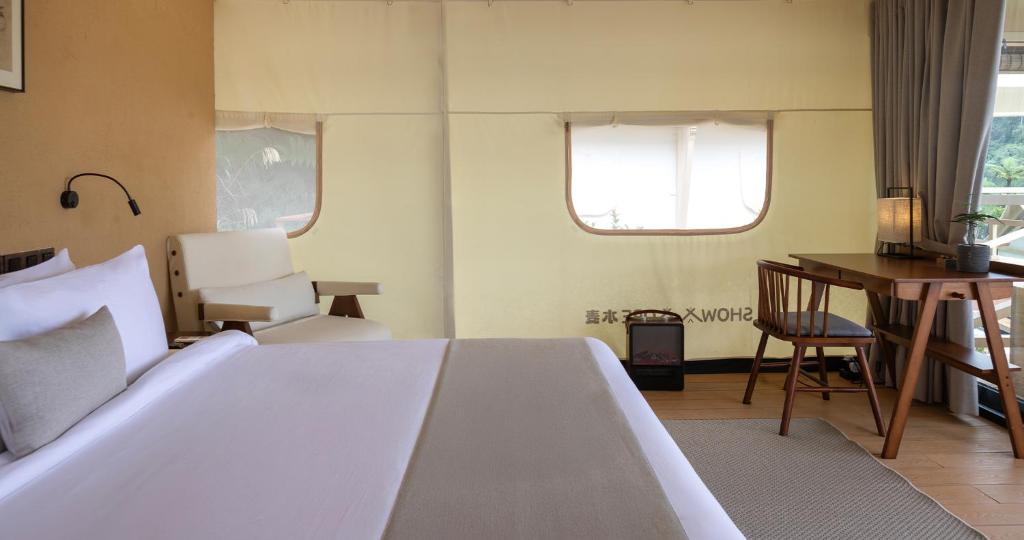 Letto o letti in una camera di Zen By Stellar Cameron