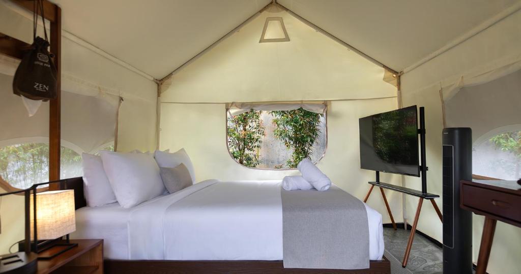 Letto o letti in una camera di Zen By Stellar Cameron