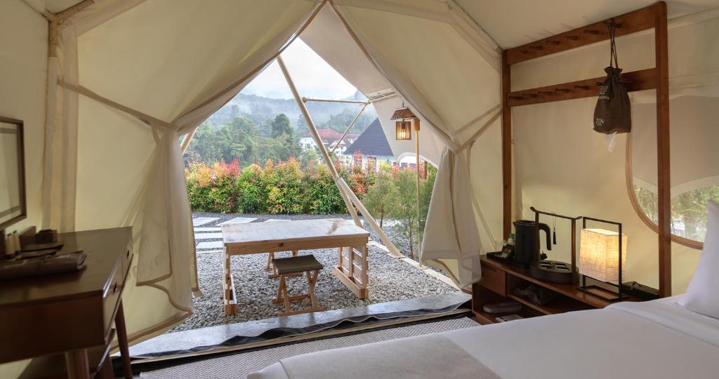 Letto o letti in una camera di Zen By Stellar Cameron