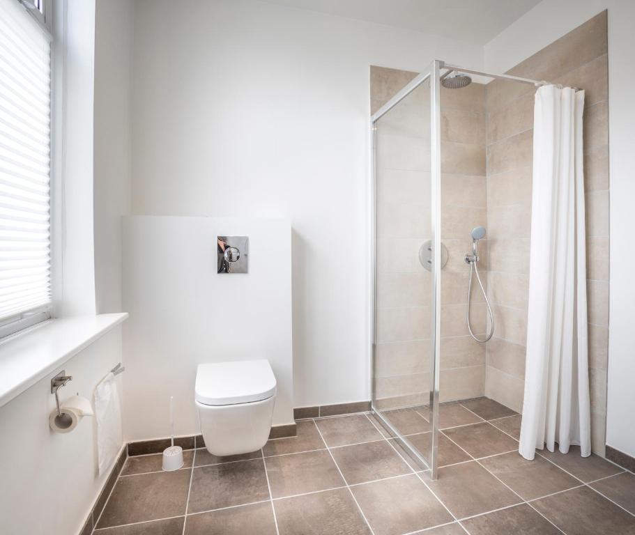Koupelna v ubytování Hotel Birksø