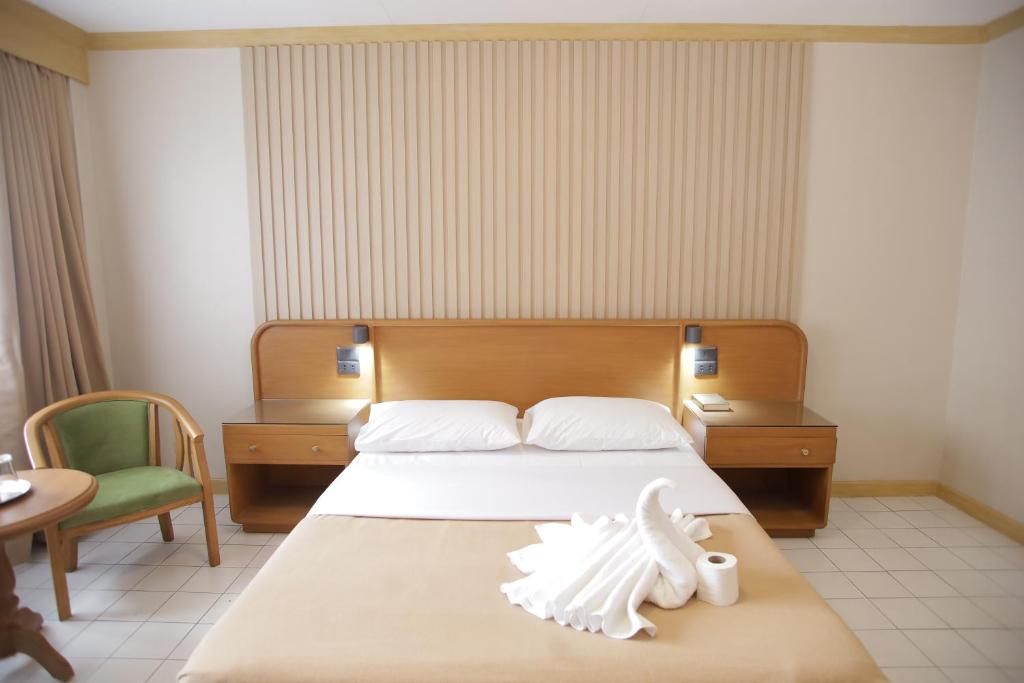 Postel nebo postele na pokoji v ubytování Hotel Soriente