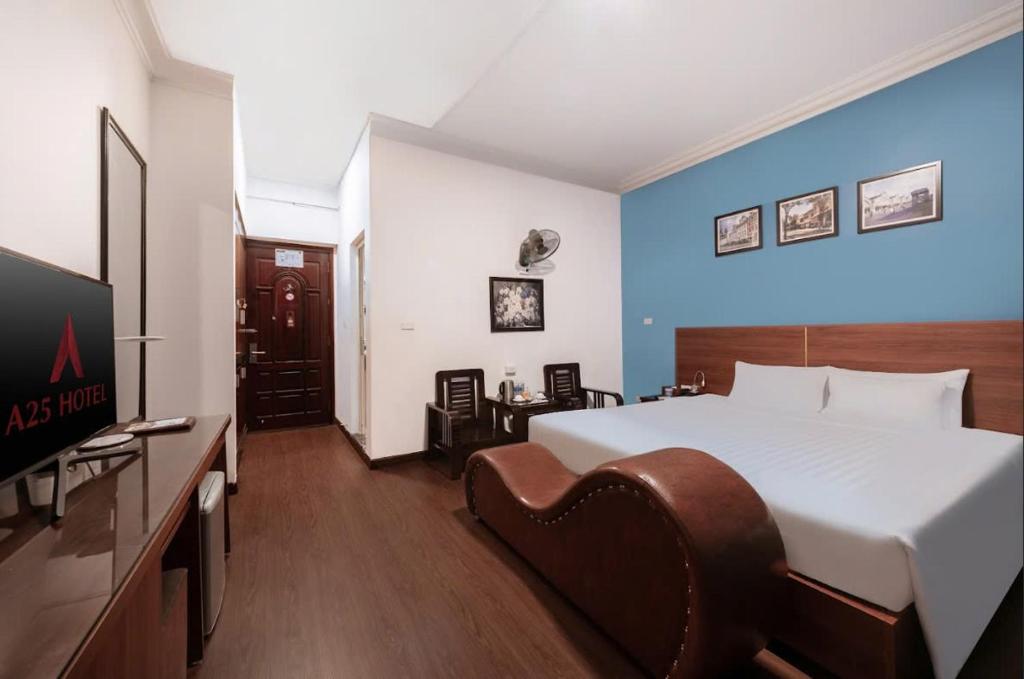 Postel nebo postele na pokoji v ubytování A25 Hotel - 45B Giảng Võ