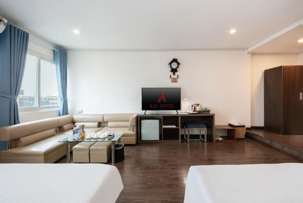 Postel nebo postele na pokoji v ubytování A25 Hotel - 45B Giảng Võ