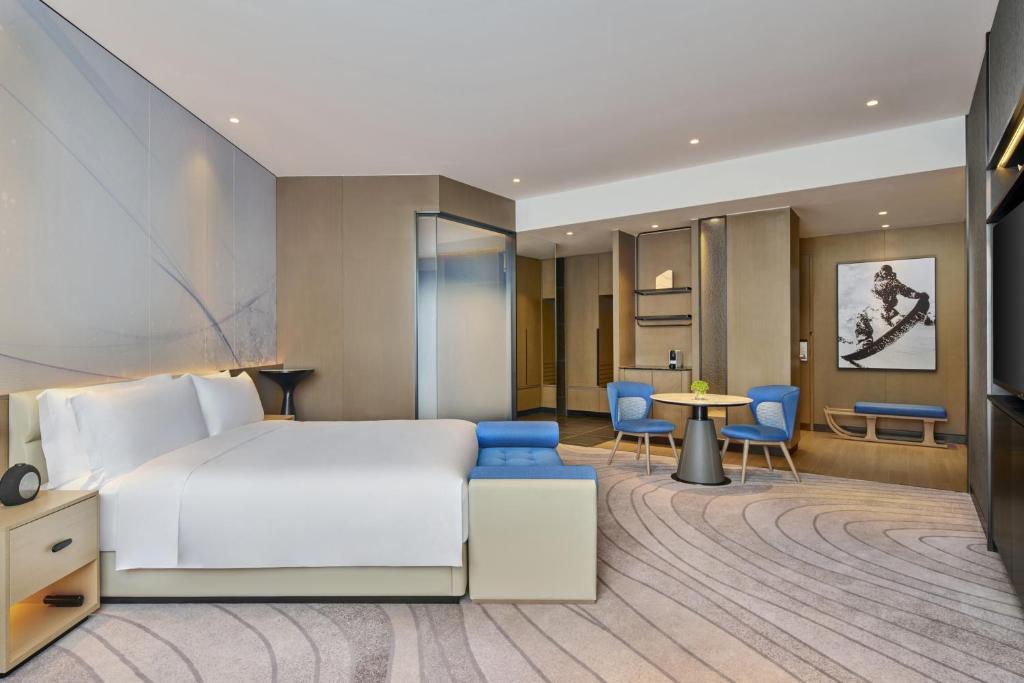 Posezení v ubytování Crowne Plaza Shanghai Snow World by IHG