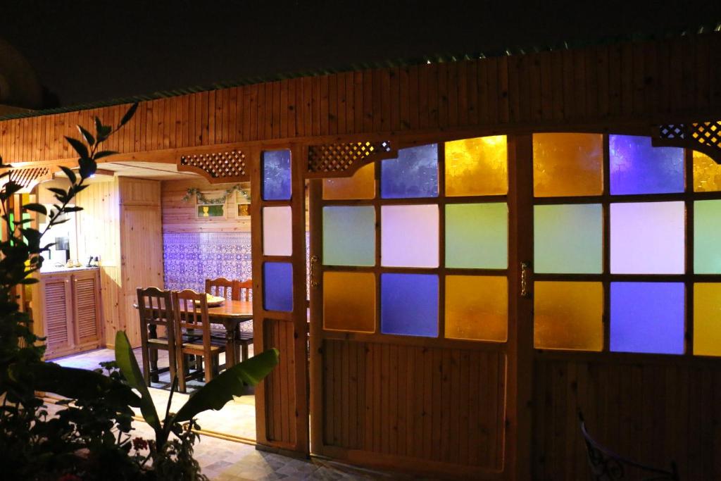 a room with a bunch of stained glass windows at Riad Les Chtis D'Agadir in Agadir