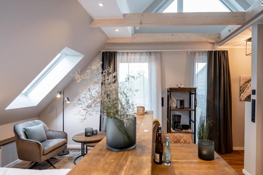 a living room with a skylight and a table at 4Hafenzeiten - NIE13 Eva in Niendorf