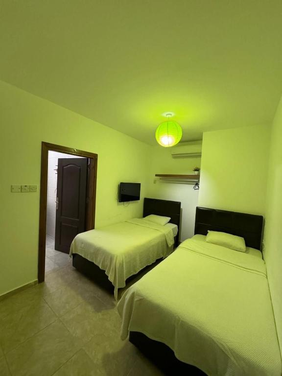 Postel nebo postele na pokoji v ubytování Betul Guest House