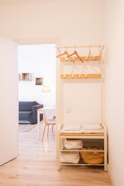 Posteľ alebo postele v izbe v ubytovaní Apartamento NUEVO con encanto en SAGRADA FAMILIA