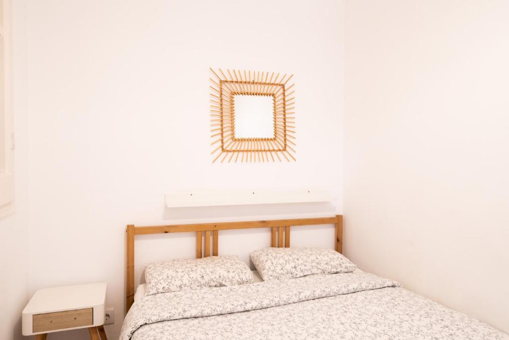 Posteľ alebo postele v izbe v ubytovaní Apartamento NUEVO con encanto en SAGRADA FAMILIA