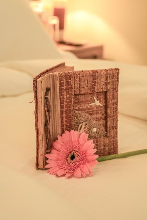 Postel nebo postele na pokoji v ubytování Ayuda Sanctuary Wellness Boutique