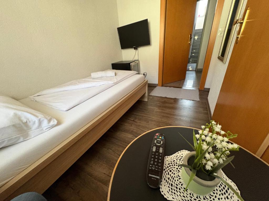 Postel nebo postele na pokoji v ubytování Gasthof Knezevic