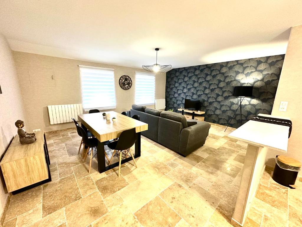 منطقة جلوس في Le Petit Phuket - Appartement confortable et calme - Proche de toutes commodité - Stationnement facile à proximité