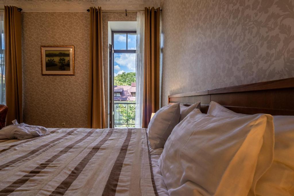 Postel nebo postele na pokoji v ubytování Artis Centrum Hotels