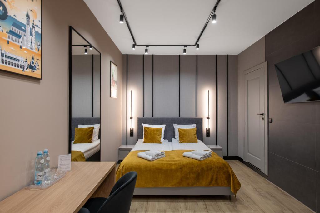 Postel nebo postele na pokoji v ubytování Platinia Premium Apartments