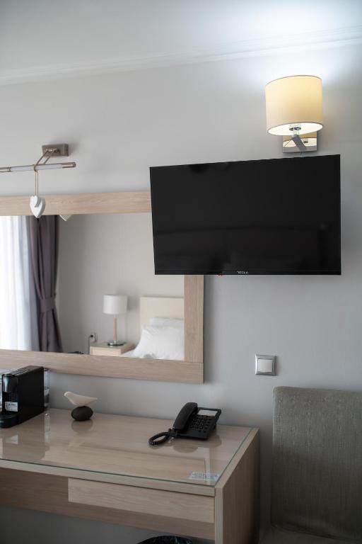 TV a/nebo společenská místnost v ubytování La Luna Hotel