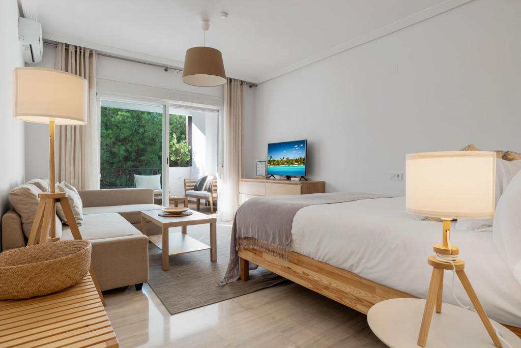 TV a/nebo společenská místnost v ubytování Confortable estudio en medina garden ref 332