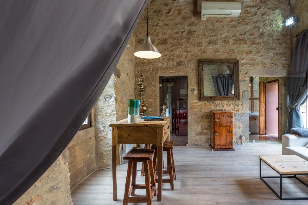 Posezení v ubytování AS Palau dels Alemanys Suites Boutique Monument