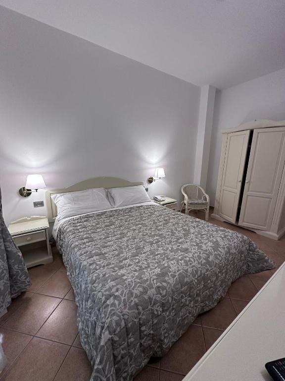 Cama ou camas em um quarto em Hotel Terranova