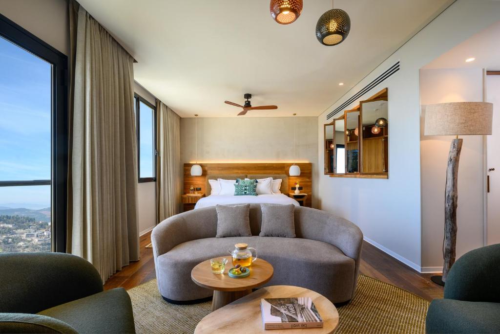 Posezení v ubytování Hotel Canaan - Fattal Limited Edition