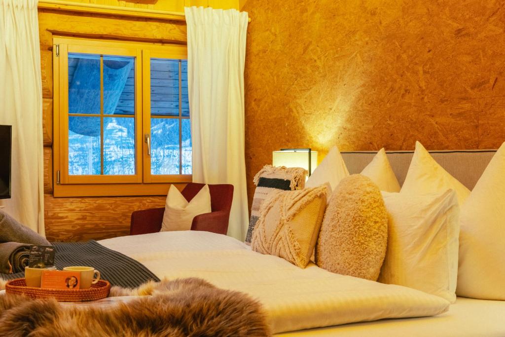 Postel nebo postele na pokoji v ubytování Standard 2 - Heiti Lodge