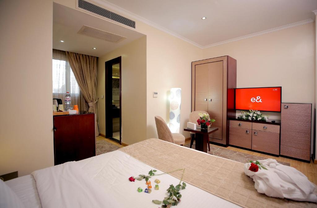 TV a/nebo společenská místnost v ubytování Cairo Taj Hotels & Suites - Dokki