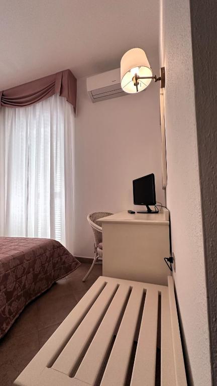 Cama ou camas em um quarto em Hotel Terranova