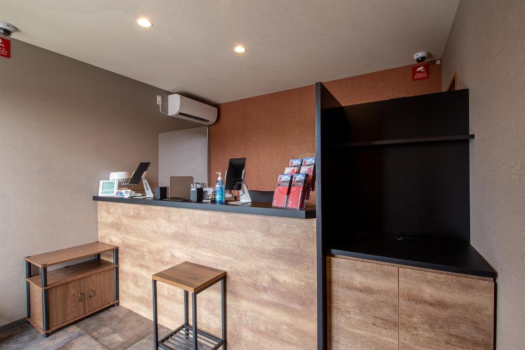 Kuchyň nebo kuchyňský kout v ubytování HOTEL R9 The Yard Yachimata