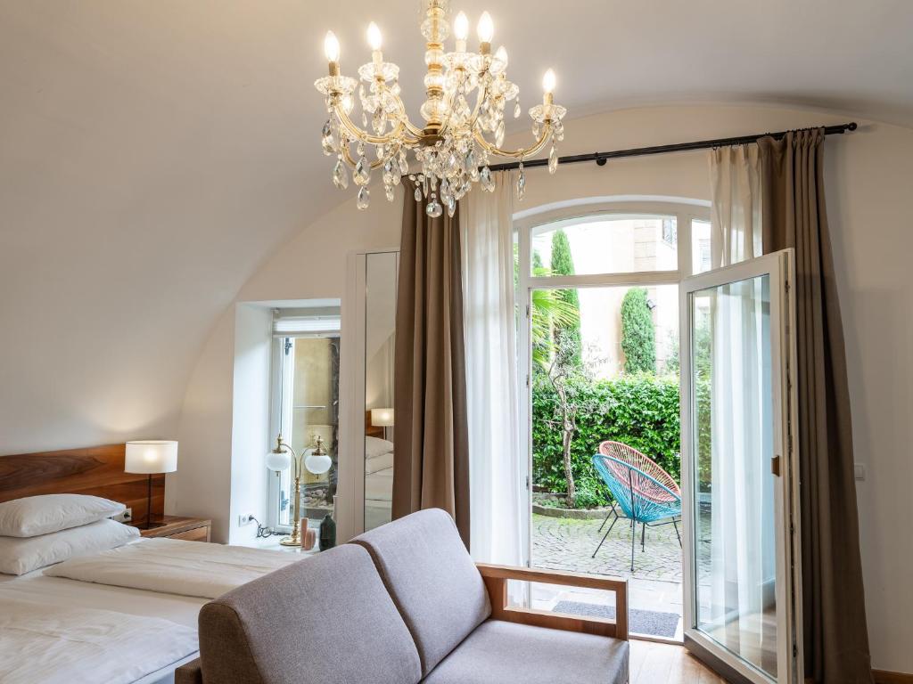 Postel nebo postele na pokoji v ubytování Romantik Hotel Jagdhof