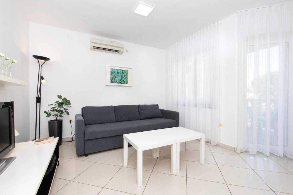 TV a/nebo společenská místnost v ubytování Apartment Lavendel - P. Dorcica