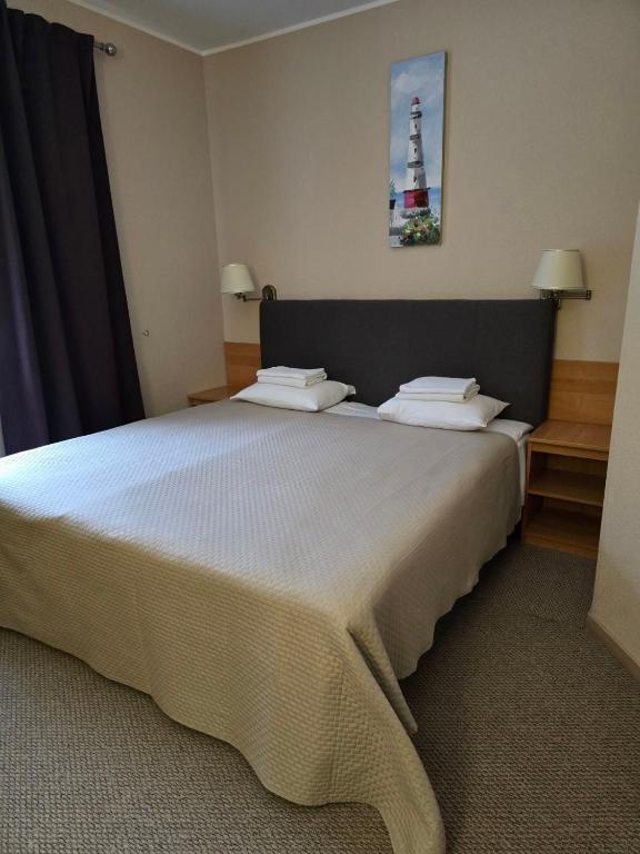 Postel nebo postele na pokoji v ubytování Hotel Yes