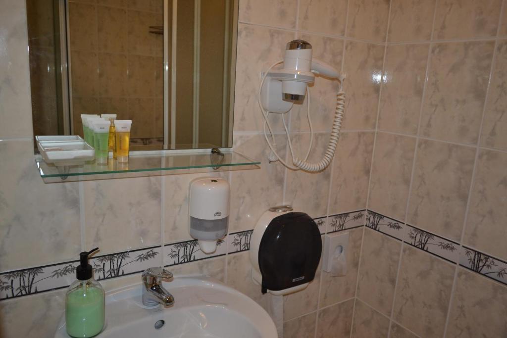 Koupelna v ubytování Hotel Yes