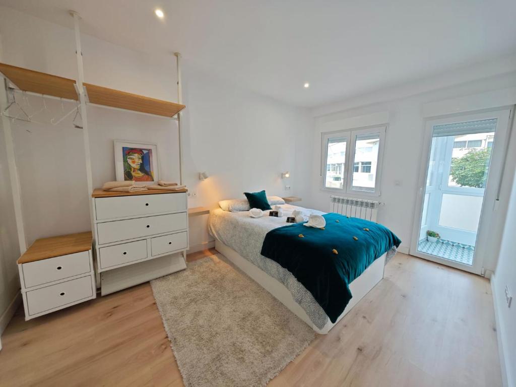 Postel nebo postele na pokoji v ubytování Tomás Paredes, Vigo, 3 habitaciones