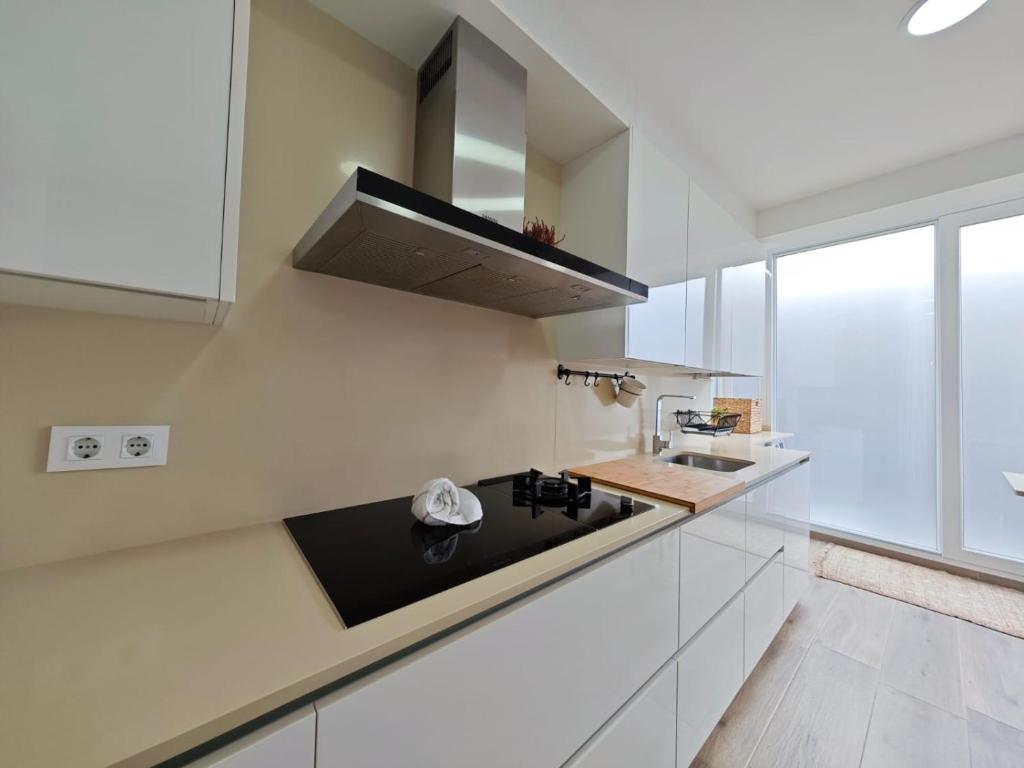 Kuchyň nebo kuchyňský kout v ubytování Tomás Paredes, Vigo, 3 habitaciones