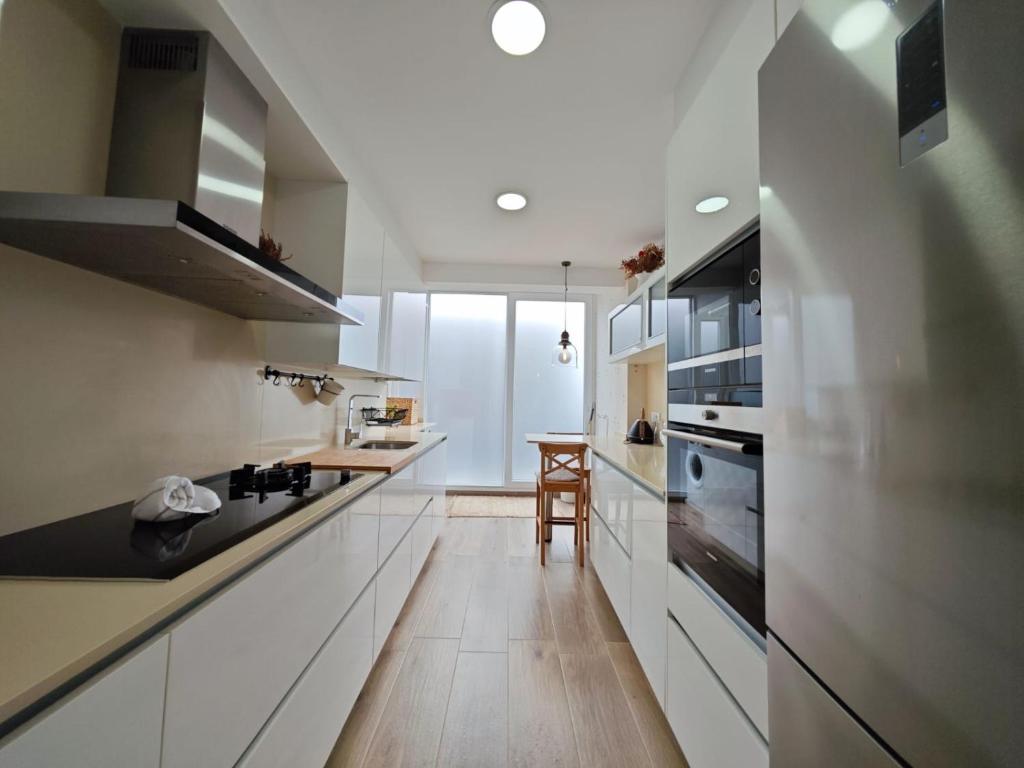 Kuchyň nebo kuchyňský kout v ubytování Tomás Paredes, Vigo, 3 habitaciones