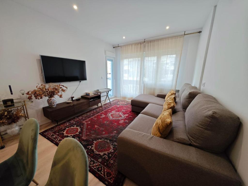 TV a/nebo společenská místnost v ubytování Tomás Paredes, Vigo, 3 habitaciones