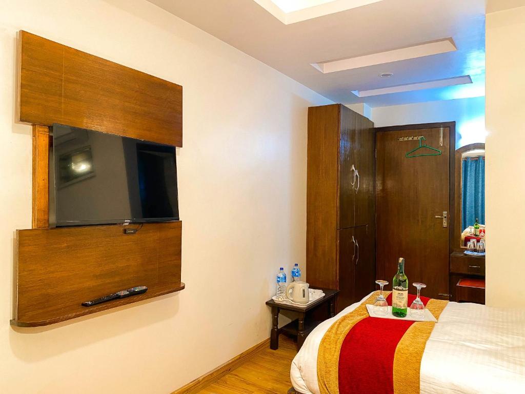 Postel nebo postele na pokoji v ubytování Hotel Abi International