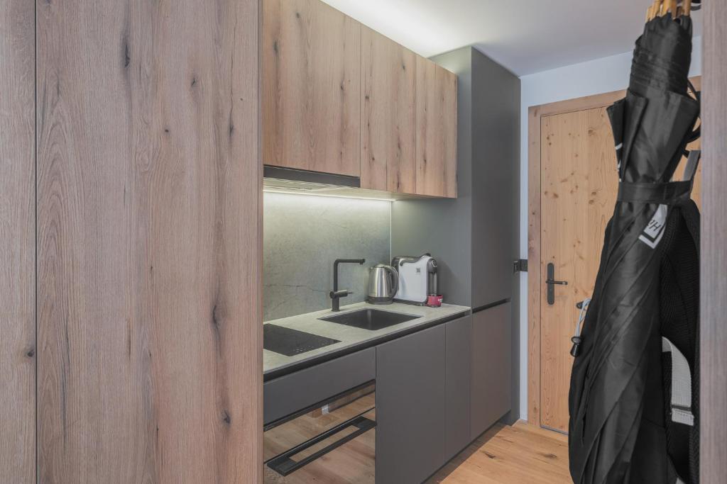 Kuchyň nebo kuchyňský kout v ubytování Val Saraina Apartments