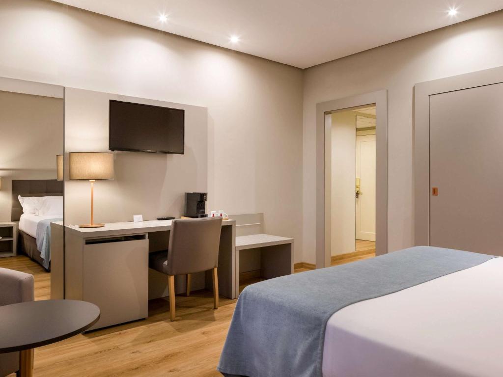 Postel nebo postele na pokoji v ubytování Mercure Carlton Rioja