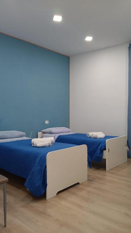 A bed or beds in a room at Renovated Loft with Vesuvio view terrace