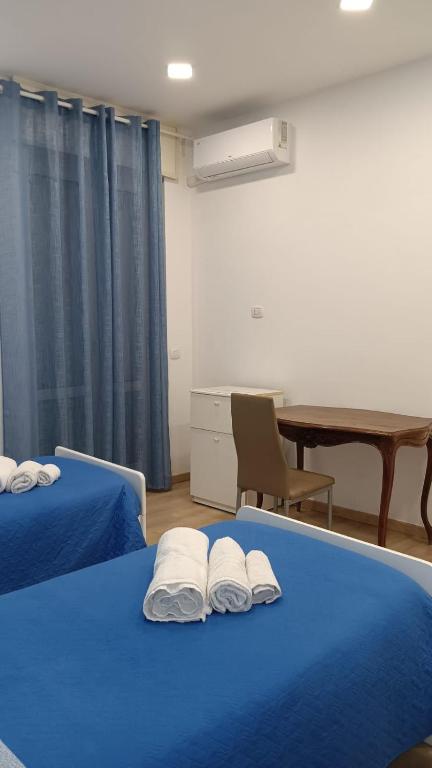 A bed or beds in a room at Renovated Loft with Vesuvio view terrace