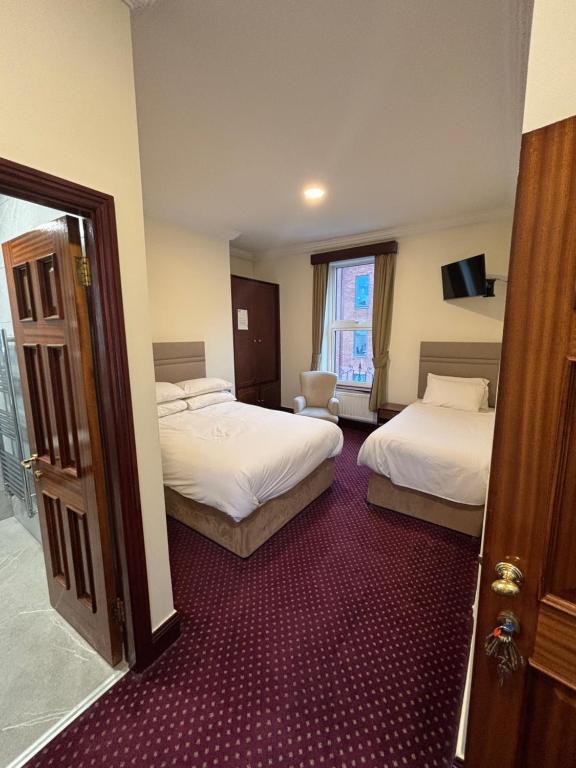 Cama ou camas em um quarto em O'Donoghue's