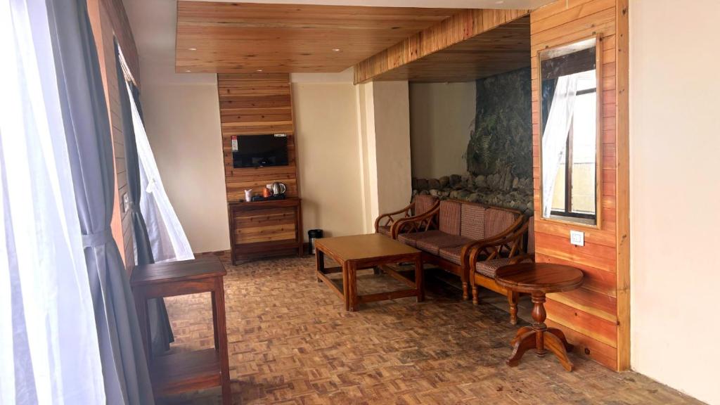 TV a/nebo společenská místnost v ubytování Delo Retreat
