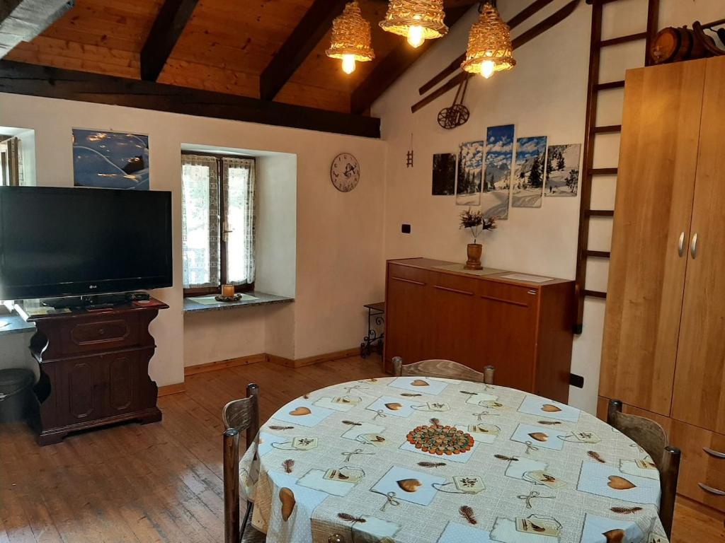 TV a/nebo společenská místnost v ubytování Sotto il Cielo