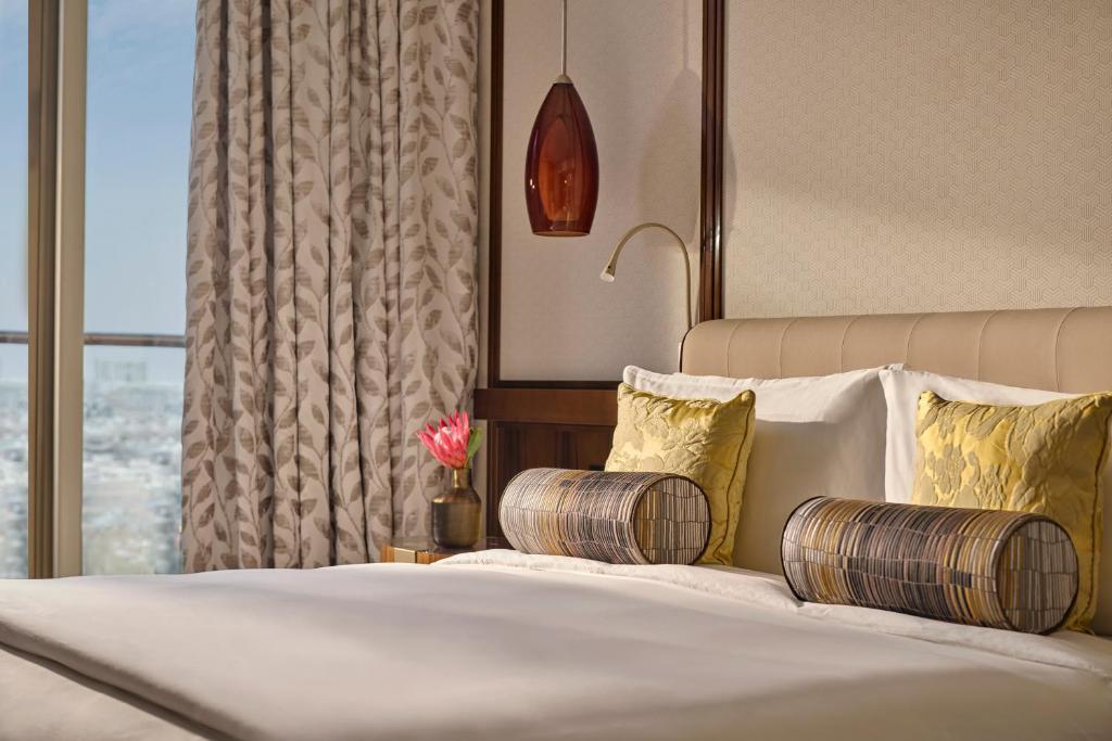 Postel nebo postele na pokoji v ubytování Mandarin Oriental Al Faisaliah, Riyadh