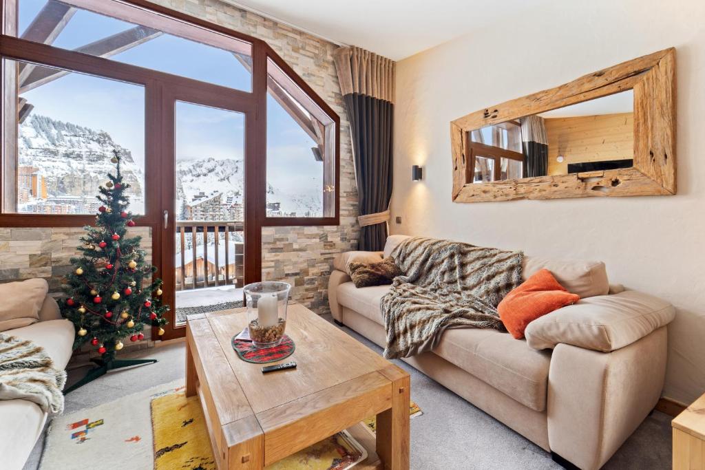 Posezení v ubytování Chalet Neva - luxury chalet with sauna by Avoriaz Chalets
