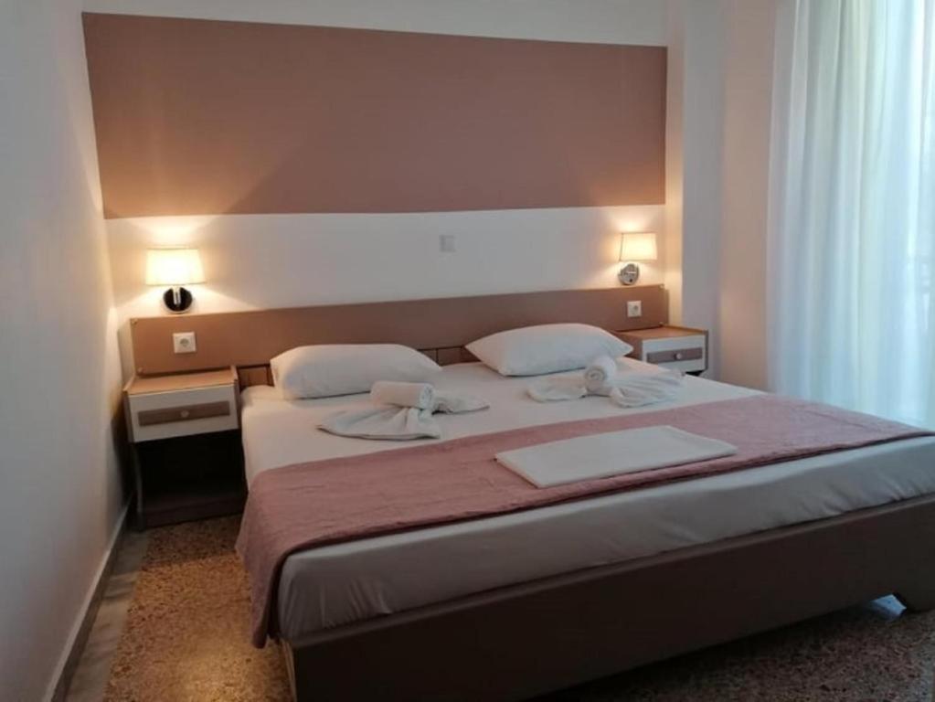Postel nebo postele na pokoji v ubytování Vanta Hotel