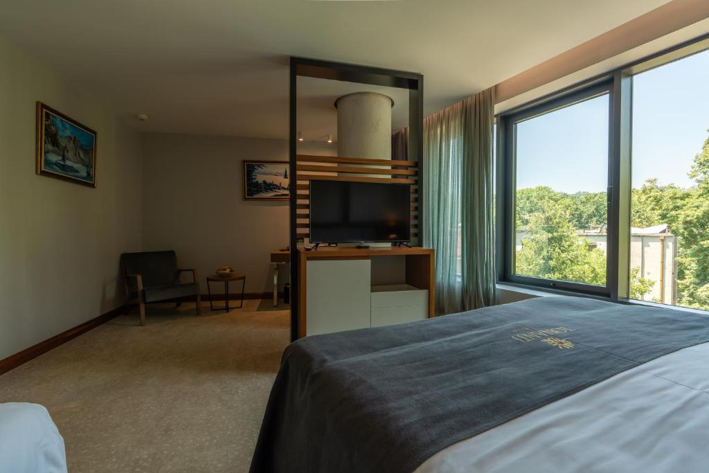 Postel nebo postele na pokoji v ubytování Hotel Tonanti