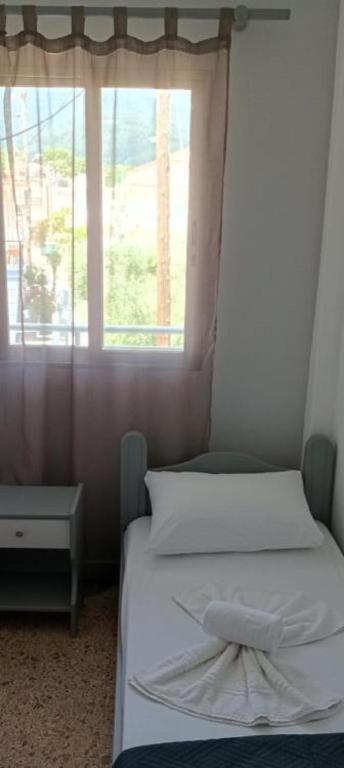 Postel nebo postele na pokoji v ubytování Vanta Hotel
