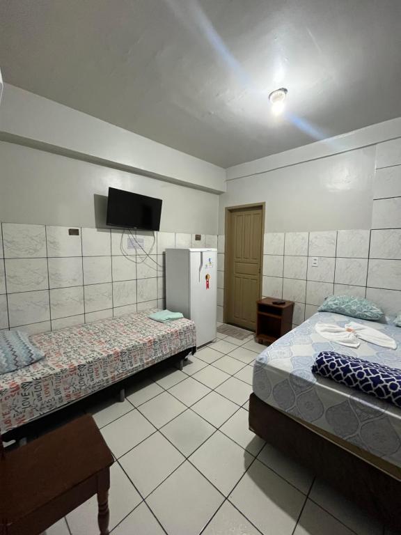 Postel nebo postele na pokoji v ubytování Hotel Granada Concept