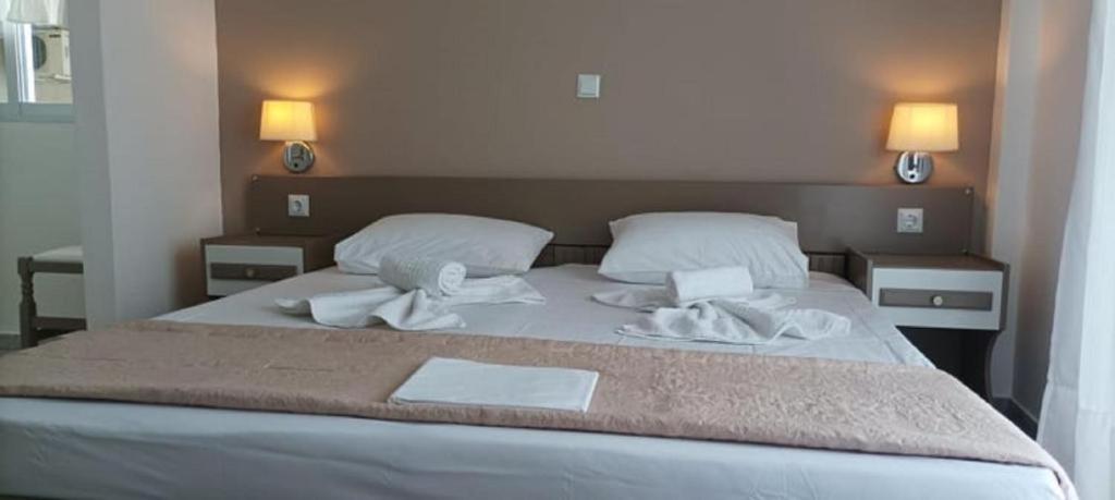 Postel nebo postele na pokoji v ubytování Vanta Hotel